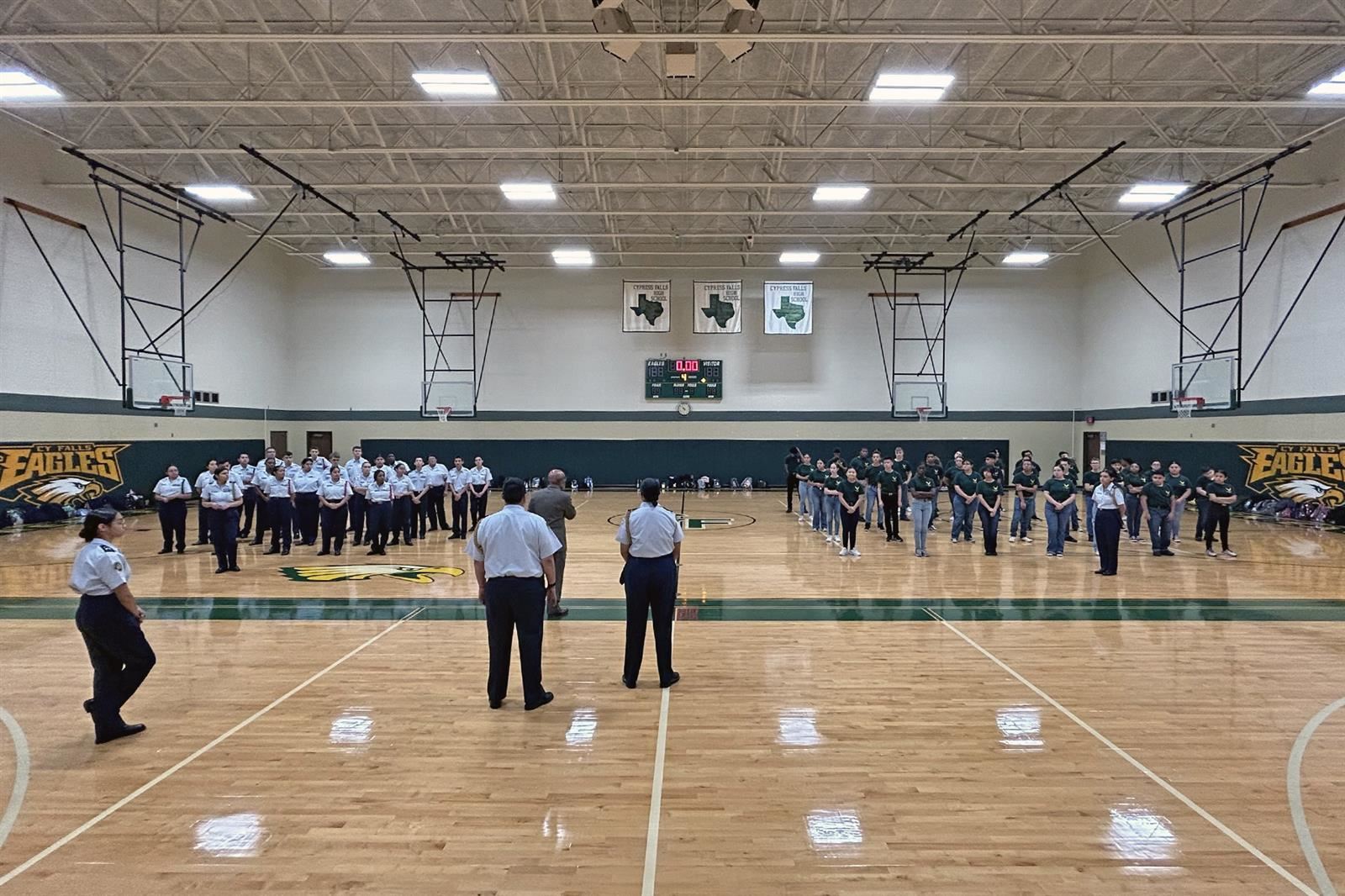 Cadets in the Cypress Falls High School AFJROTC Unit TX-20003 stand in formation during their Headquarters Unit Inspection.